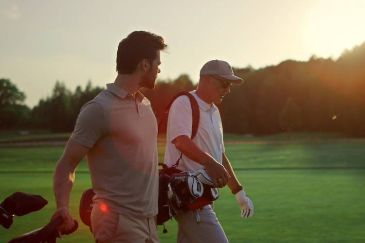 men playing golf